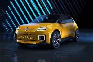 La nouvelle Renault 5 jaune sur fond futuriste.
