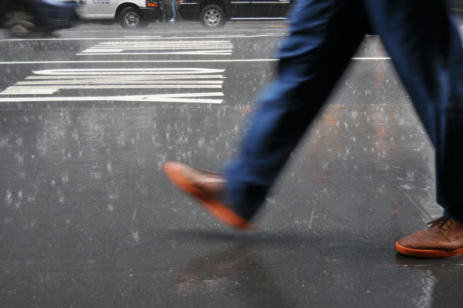 Does walking faster in the rain keep you drier? A physicist breaks it down