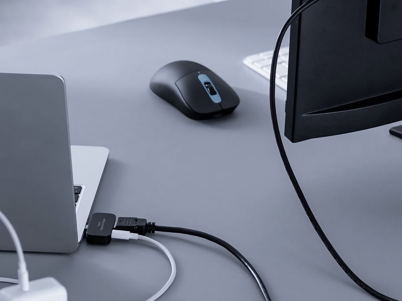 Cette souris sans sert également station d'accueil, offrant HDMI USB-C